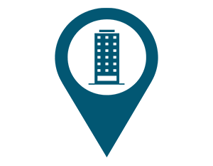 teardrop mark pin graphic with building in the marker