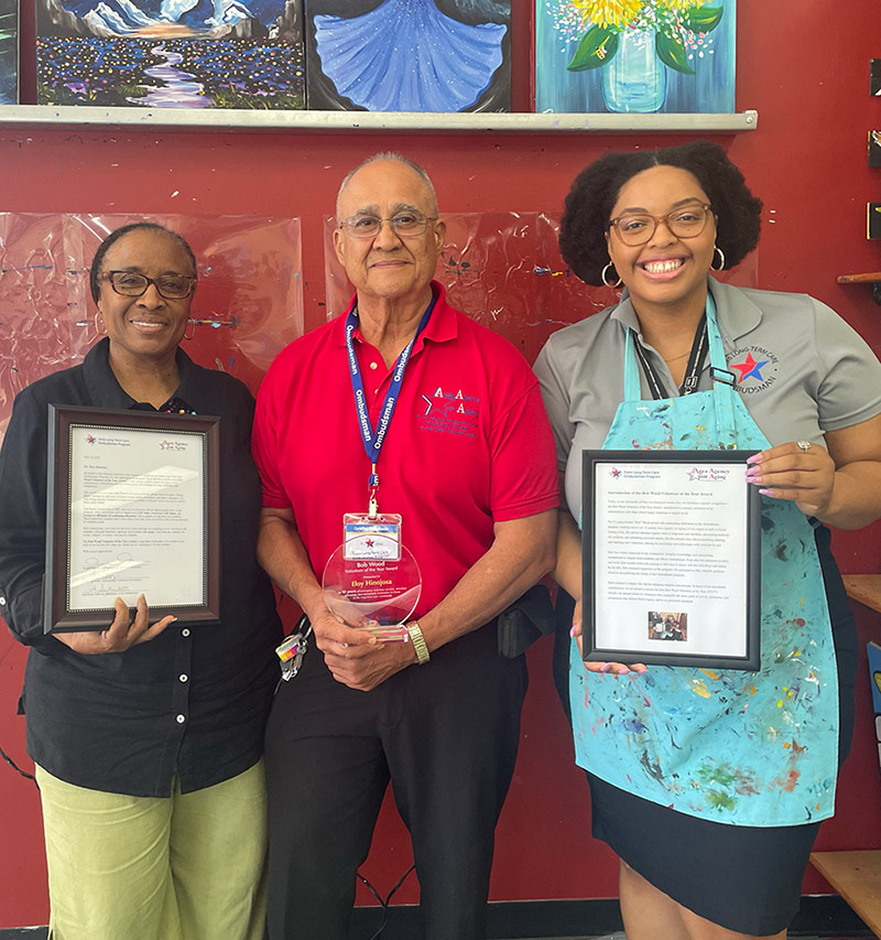 Recipient Mr. Eloy Hinojosa being presented the Bob Wood Volunteer of the Year Award