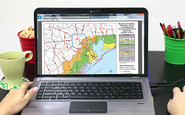 Person viewing evacuation maps online