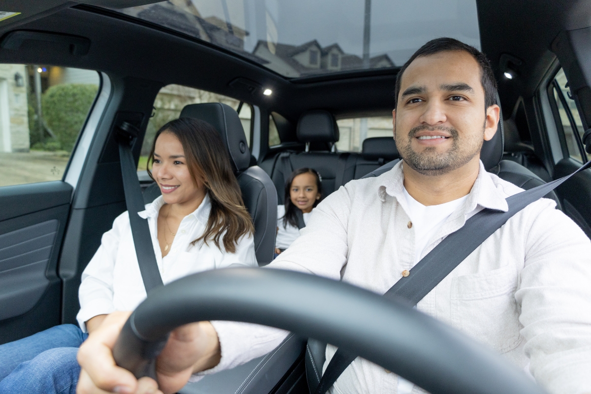 Family of four riding in a car - RTP 2050