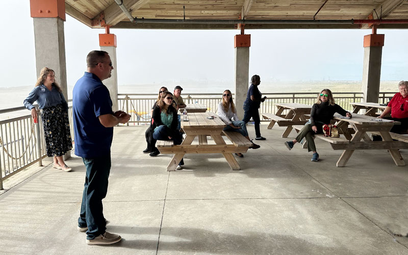 Man in front of group